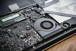 laptop fan running due to overheating and background processes