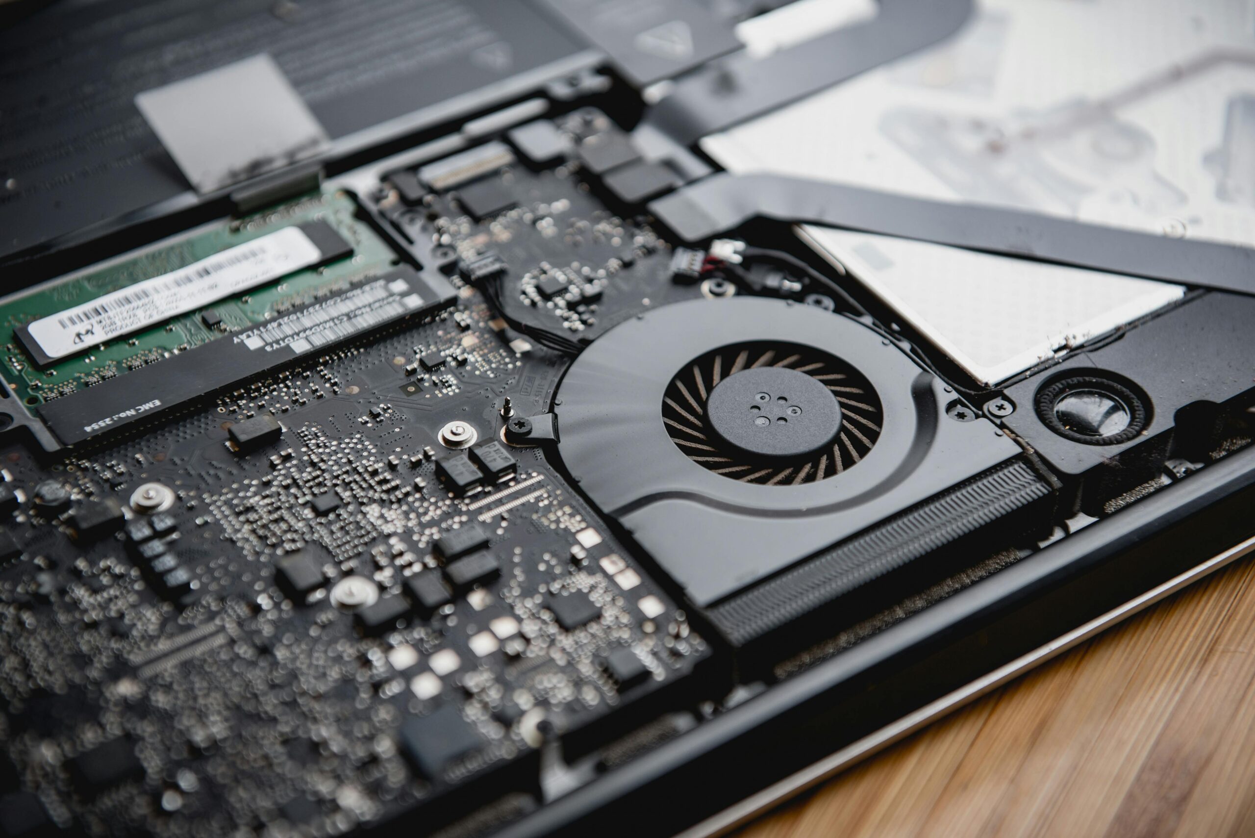 laptop fan running due to overheating and background processes