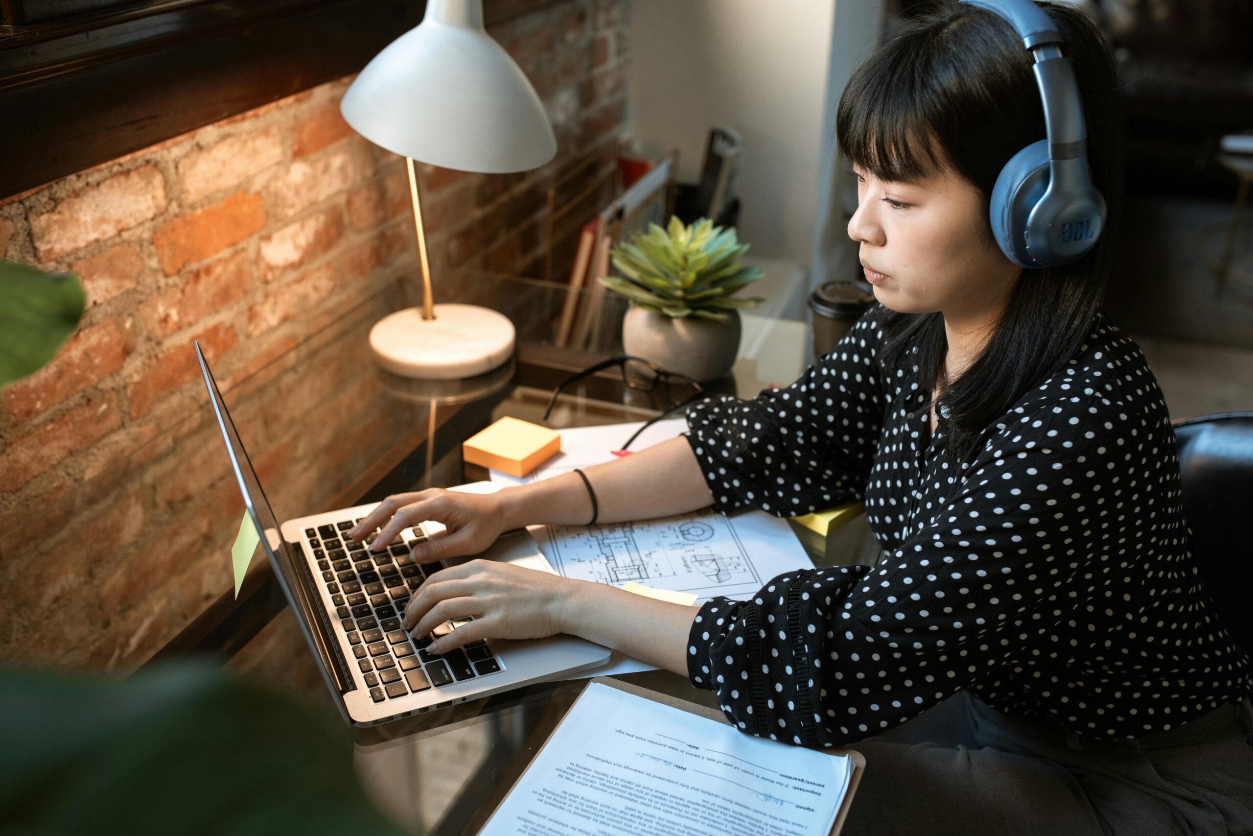 freelancer managing online banking on laptop